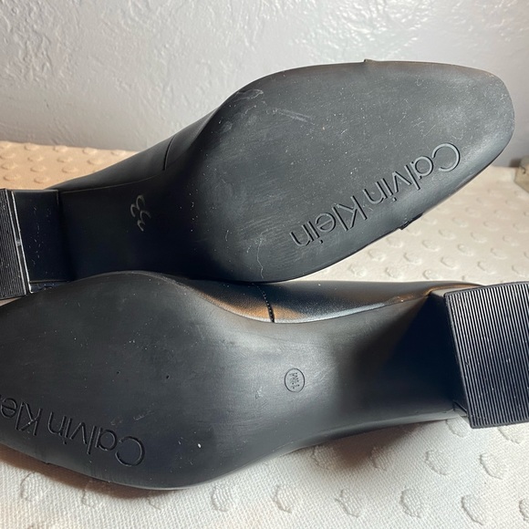 Calvin Klein Almond Toe Pump with Silver and Patent Leather Detail - Picture 4 of 16